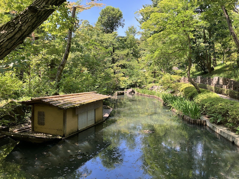 Boat on a lake in Nezu museum garden