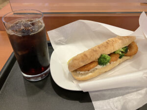 Iced coffee and garlic shrimp sandwich